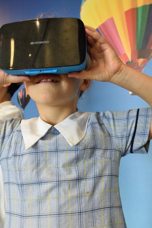 kid with virtual reality googles